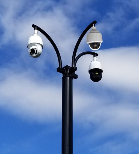 security camera poles with the ability to add lighting,